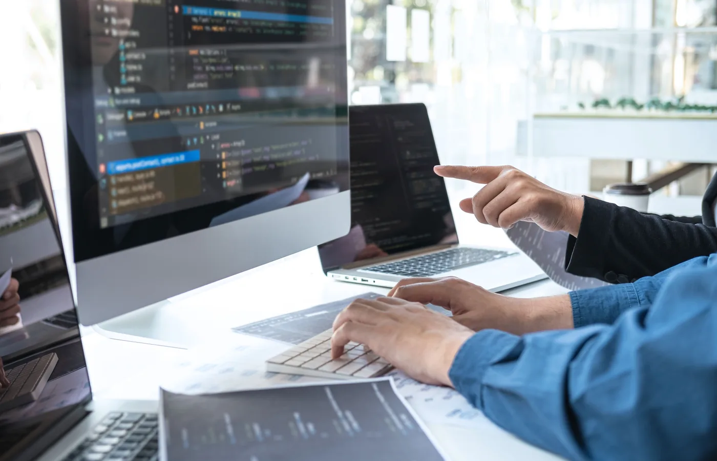 Developer working through a hands-on coding assessment reviewed by a SiloHub engineer