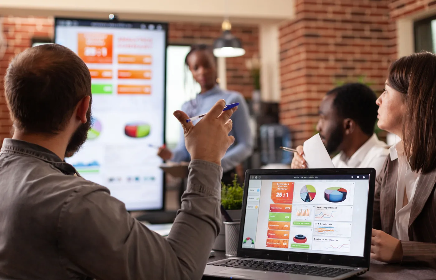 What an IT Recruitment SLA Should Include: The 7 Metrics to Demand Before You Sign 2 Hiring manager tracking time-to-fill and SLA performance reports on a laptop